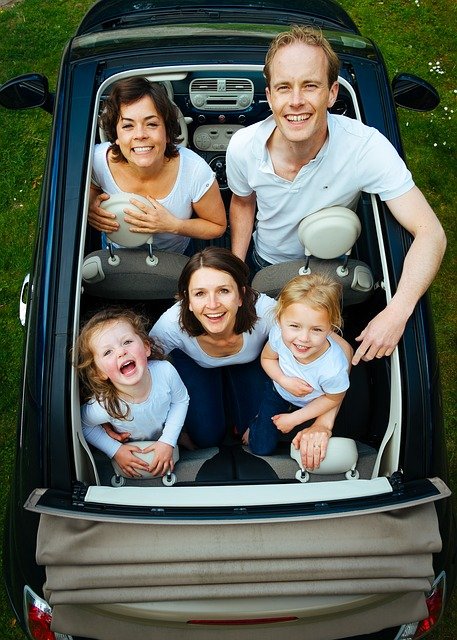 Family in a small car